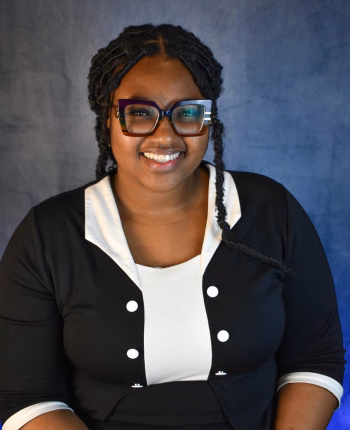 Erica Hollins (she/they) – Washington, D.C